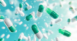 johnvibes_Pill_capsules_half_green_half_white_falling_from_th_739c0b6b-9551-4235-9824-560f7e96ab06_0